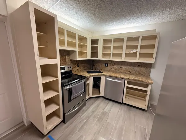 Before: cabinet boxes with the doors removed.