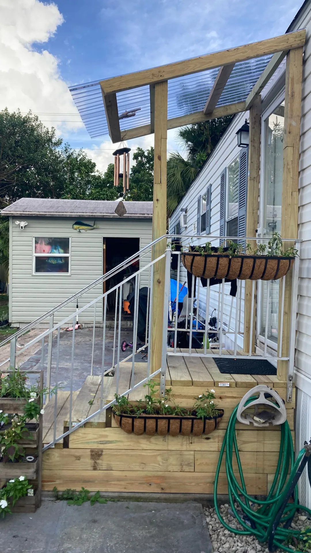 Wood deck stairs with built-in planter boxes
