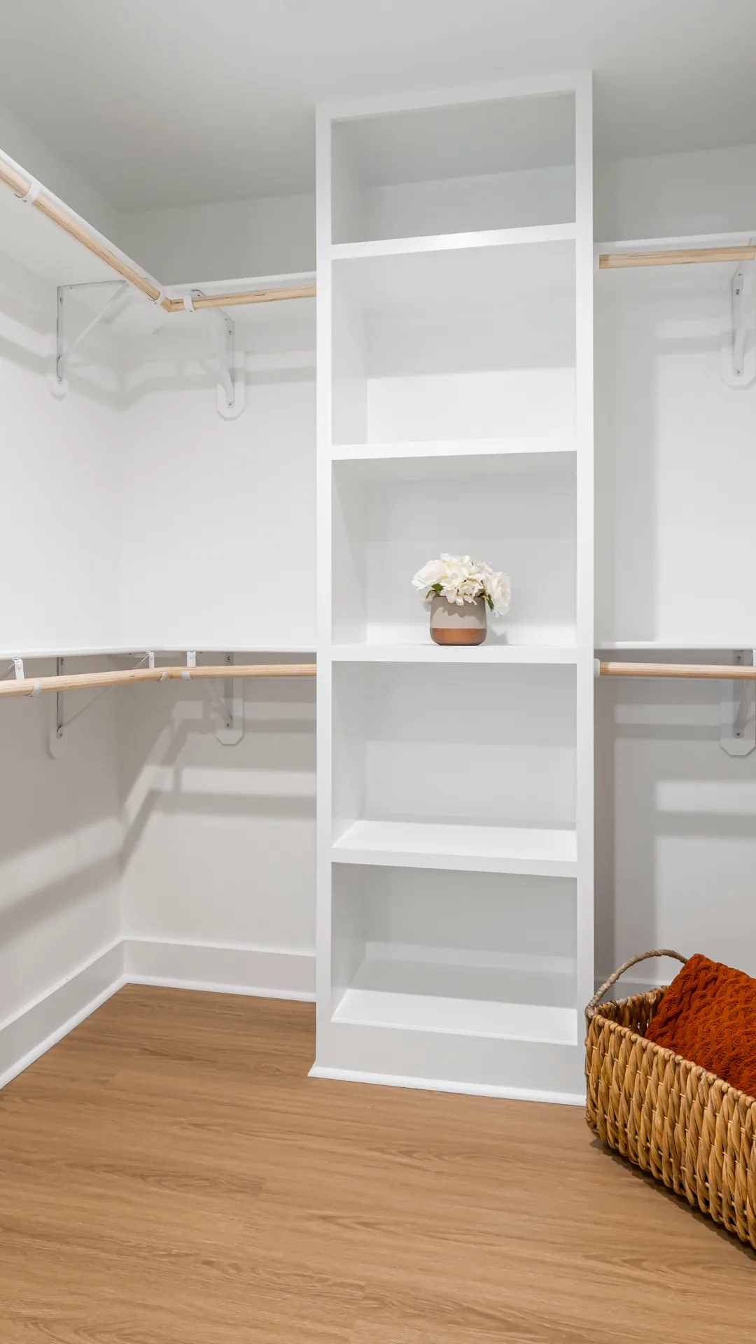 White walk-in closet with open shelving