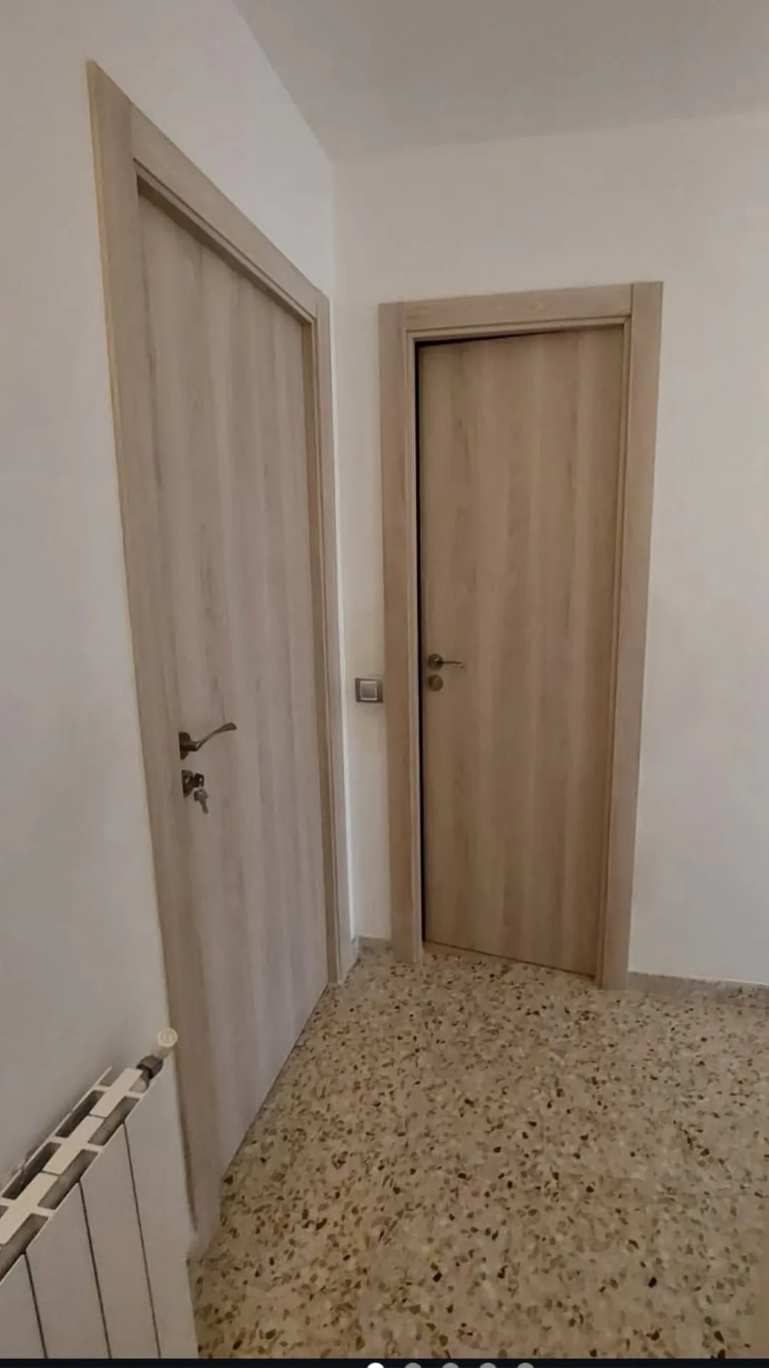 Wood interior doors installed in a hallway