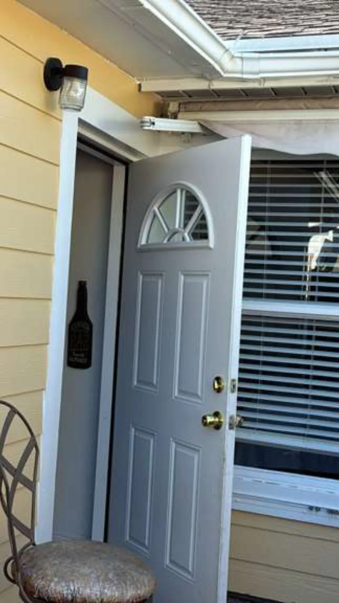 Exterior entry door with arched glass window