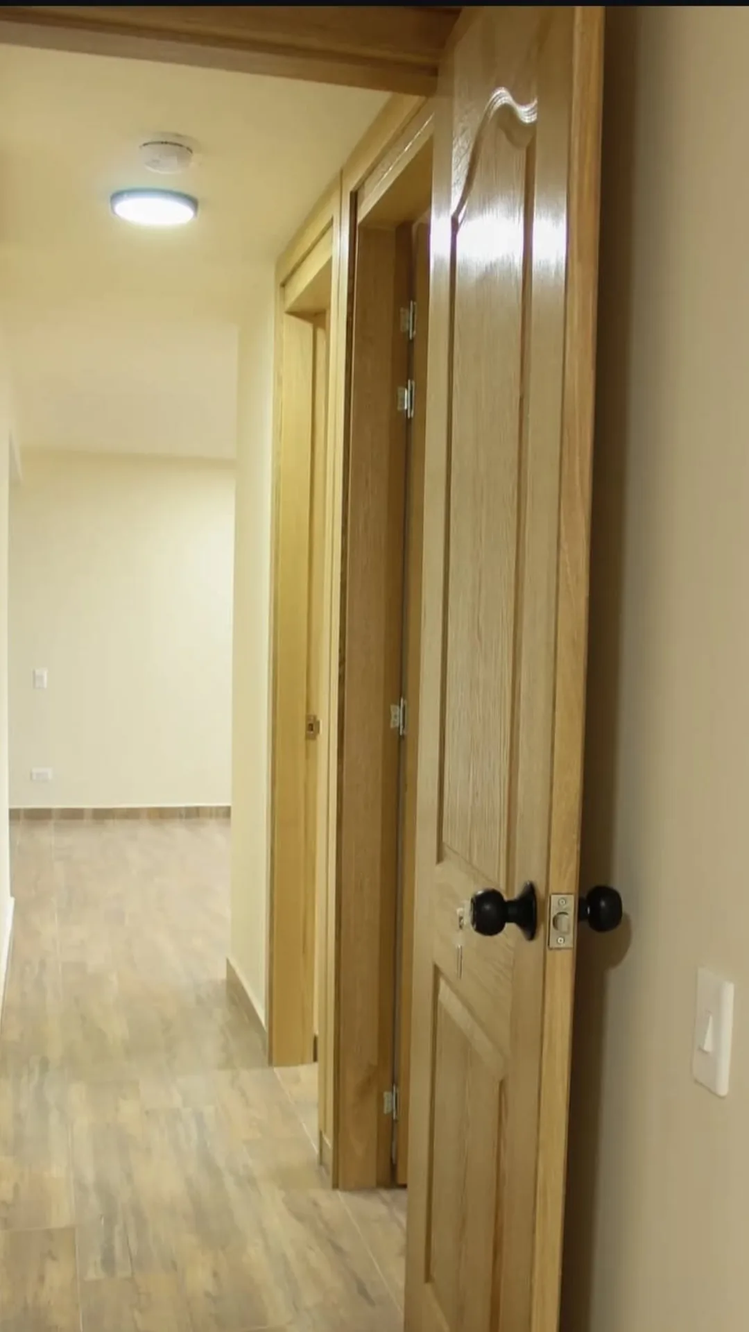 Wood interior doors in a hallway